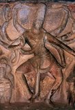 Nataraja or Nataraj ('The Lord - or King - of Dance'; Tamil: Kooththan) is a depiction of the Hindu god Shiva as the cosmic dancer Koothan who performs his divine dance to destroy a weary universe and make preparations for god Brahma to start the process of creation.<br/><br/>

Ravana Phadi cave temple is one of the oldest rock cut temples in Aihole and dates back to the 6th century CE. It is dedicated to the Hindu god Shiva. The cave contains a Shivalinga in the inner room or sanctum sanctorum. The sanctum has a vestibule with a triple entrance and has carved pillars. The walls and sides of the temple are covered with large figures including a figure of Nataraja (Shiva) dancing, surrounded by the Saptamatrikas (Seven Mothers).